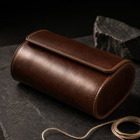 Brown leather watch travel case in use, lifestyle shot