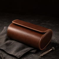 Brown leather watch travel case packed for travel, lifestyle shot